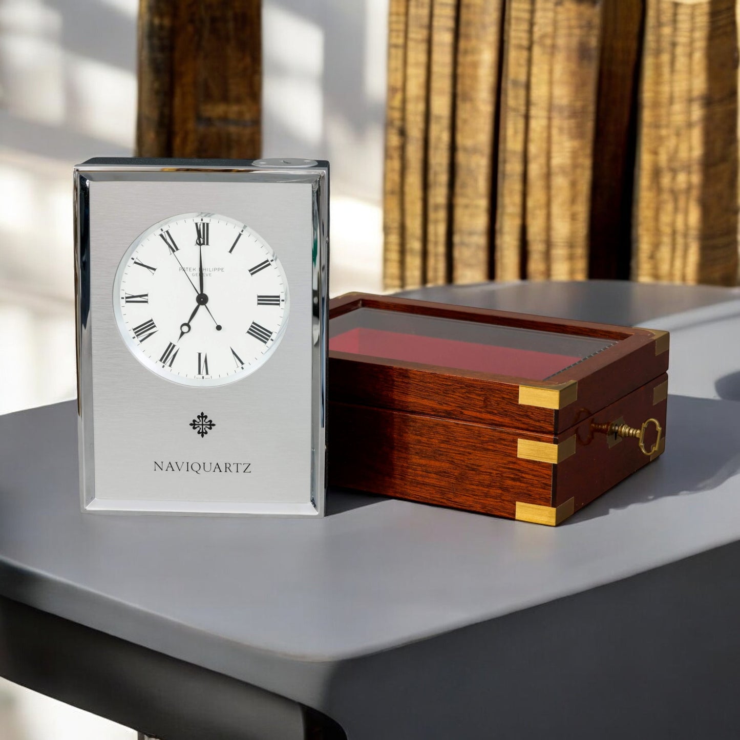 Patek Philippe Naviquartz Table clock in its original Patek mahogany case Ref. 1200 Rare