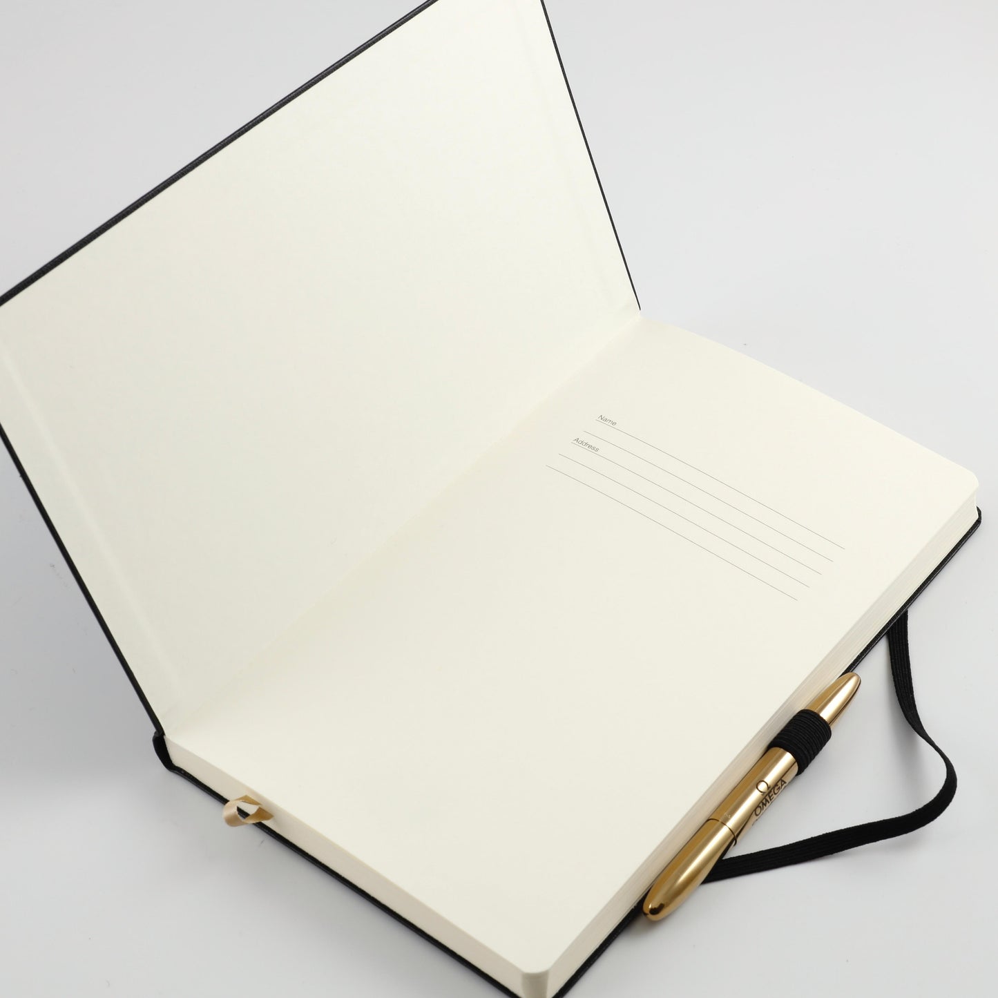 OMEGA 50th moon landing anniversary ballpoint pen stylo & a black notepad