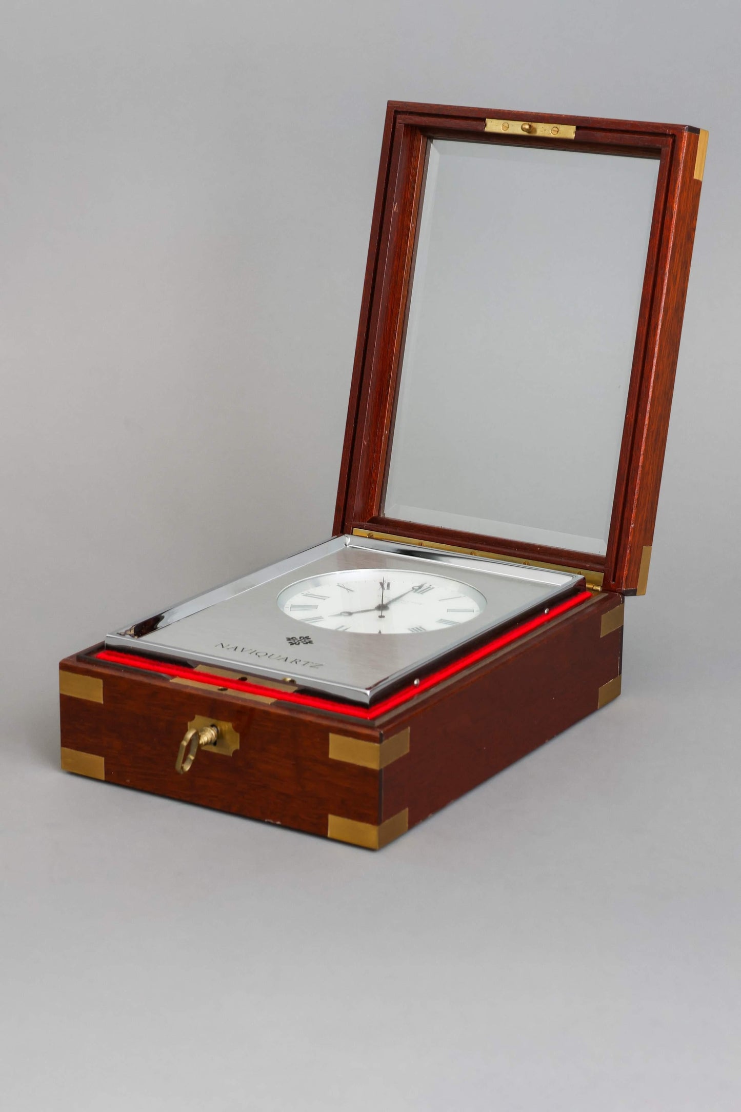 Patek Philippe Naviquartz Table clock in its original Patek mahogany case Ref. 1200 Rare