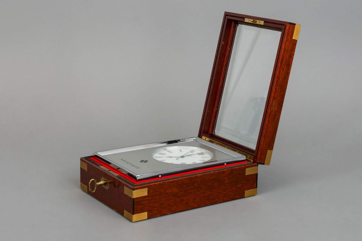 Patek Philippe Naviquartz Table clock in its original Patek mahogany case Ref. 1200 Rare