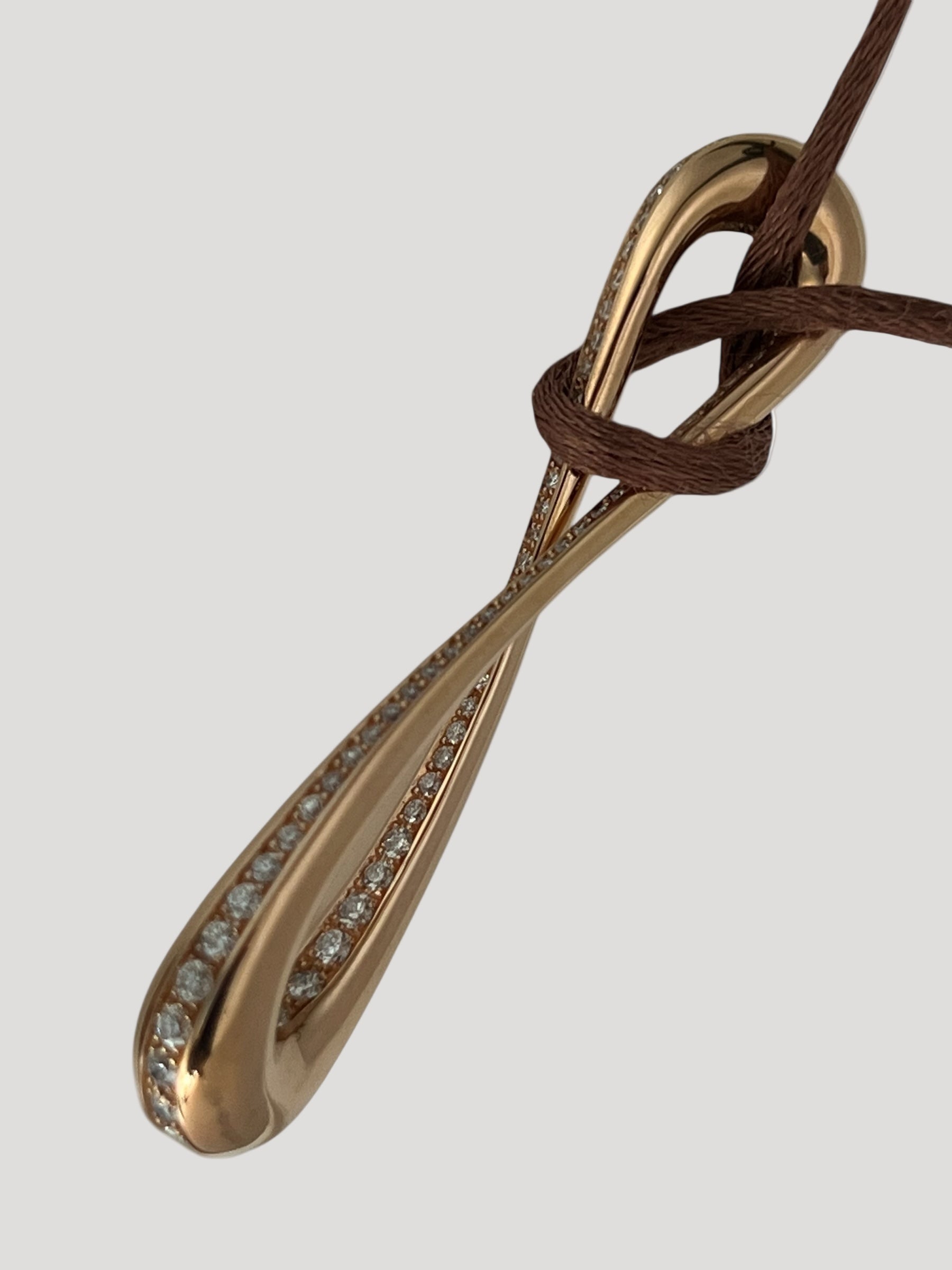 infinity rose gold pendant