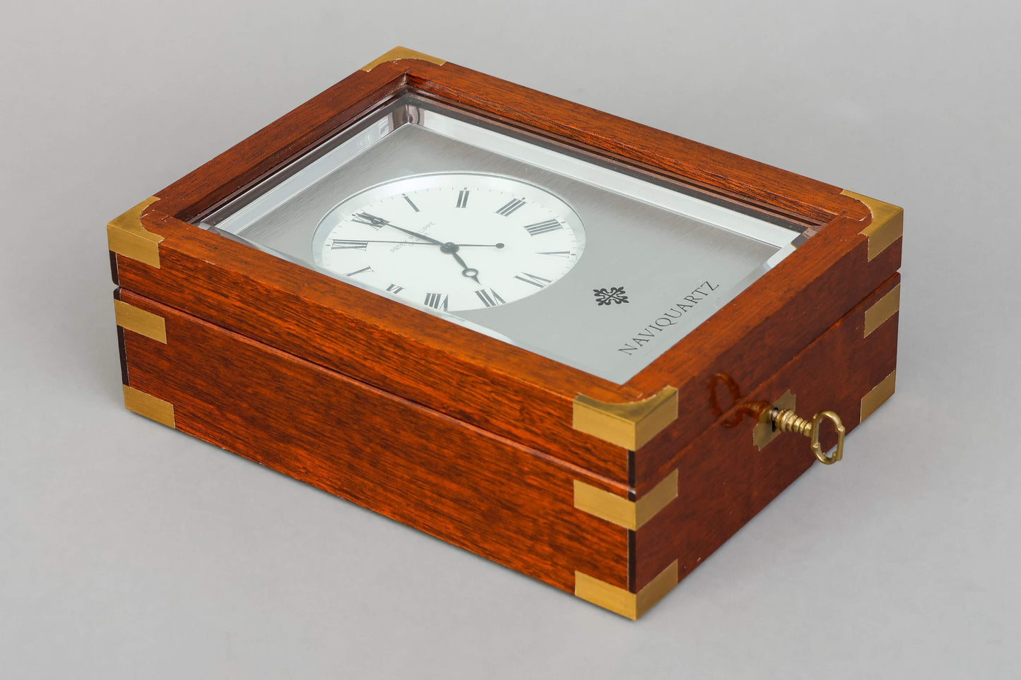 Patek Philippe Naviquartz Table clock in its original Patek mahogany case Ref. 1200 Rare