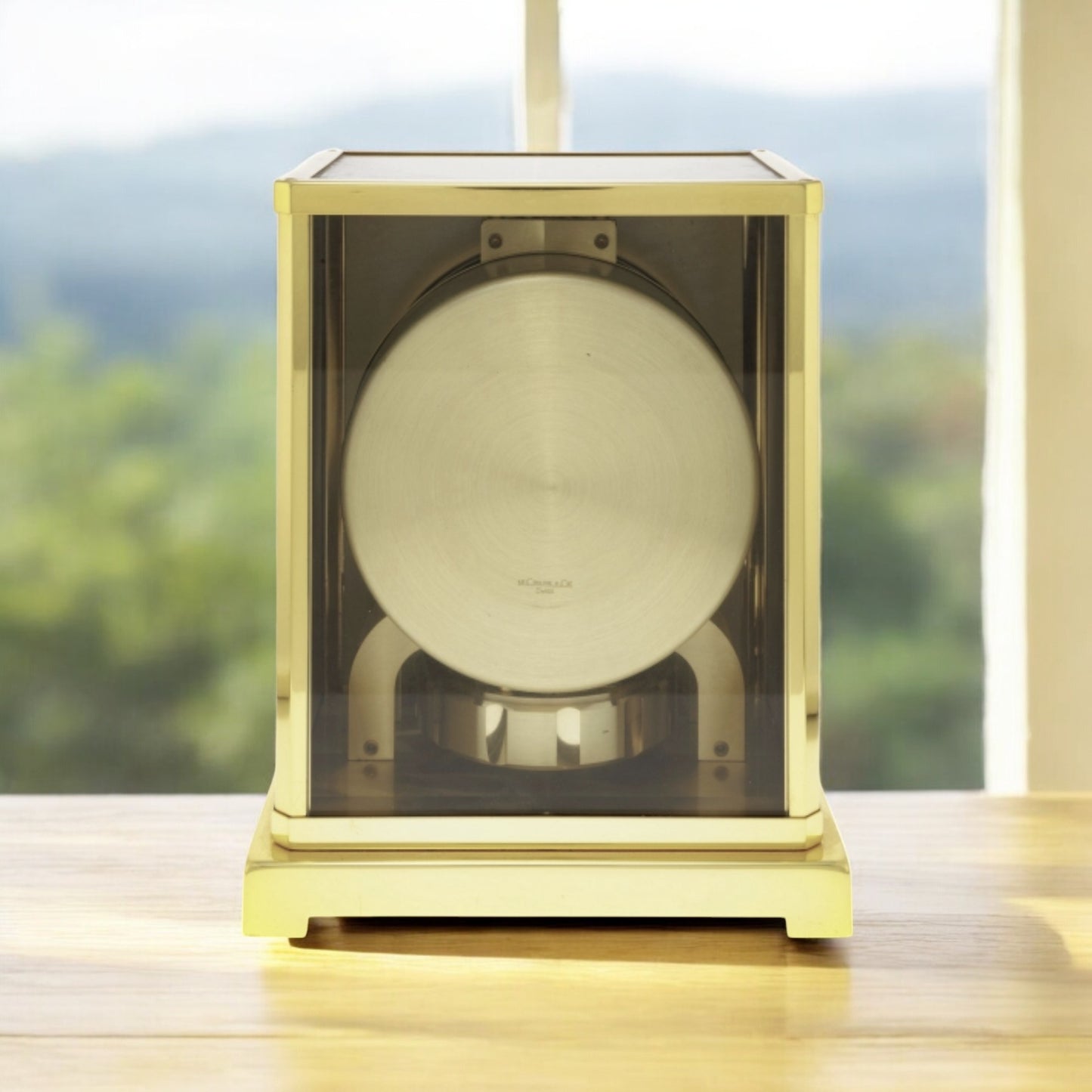 Jaeger-LeCoultre Atmos gilt metal cabinet clock with marine deco Rare model with ships