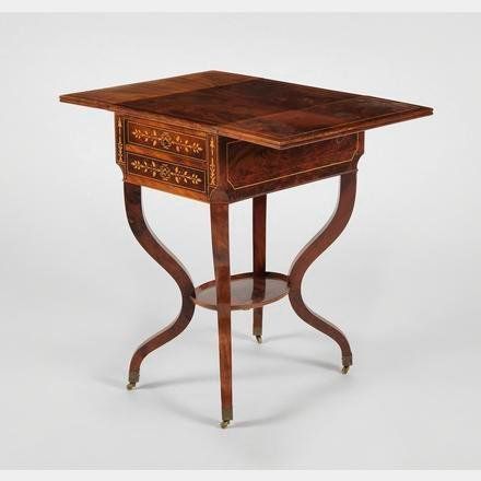 A Charles X period 'Travailleuse d'époque' walnut, rosewood and light wood