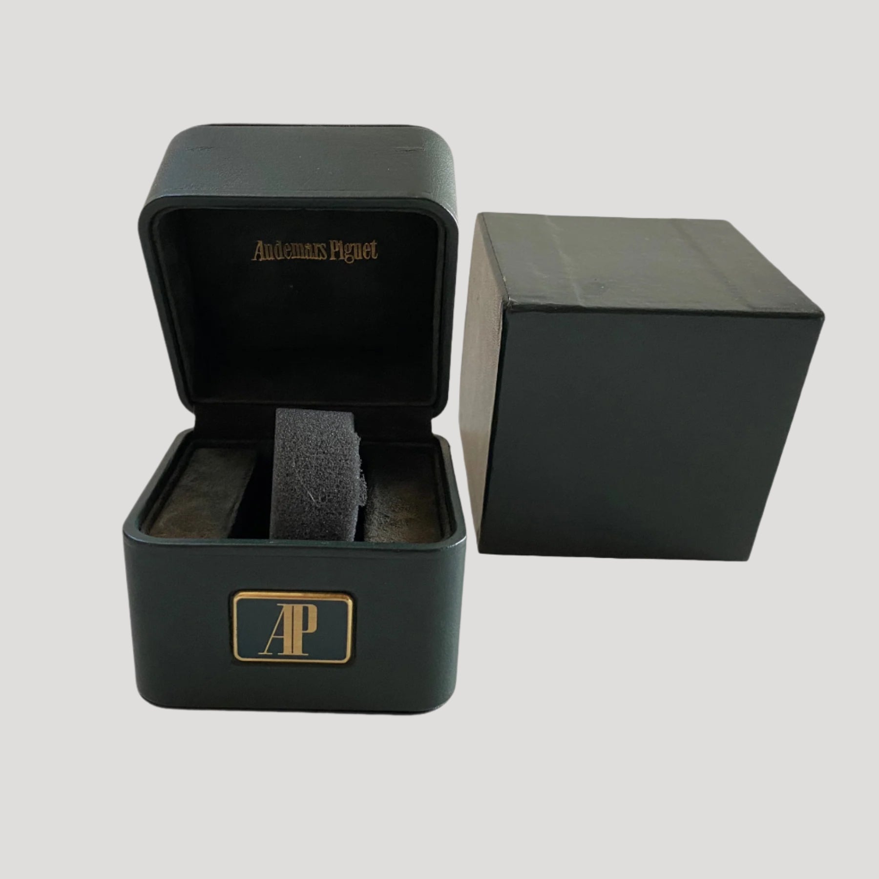 A fine vintage Audemars Piguet green leather box in its outer box