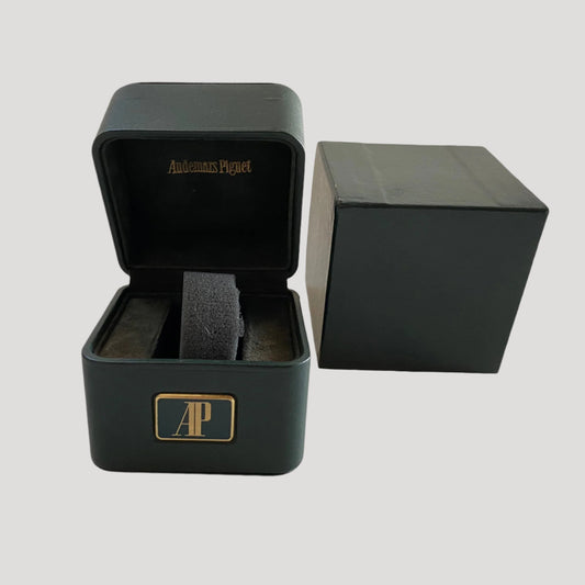 A fine vintage Audemars Piguet green leather box in its outer box