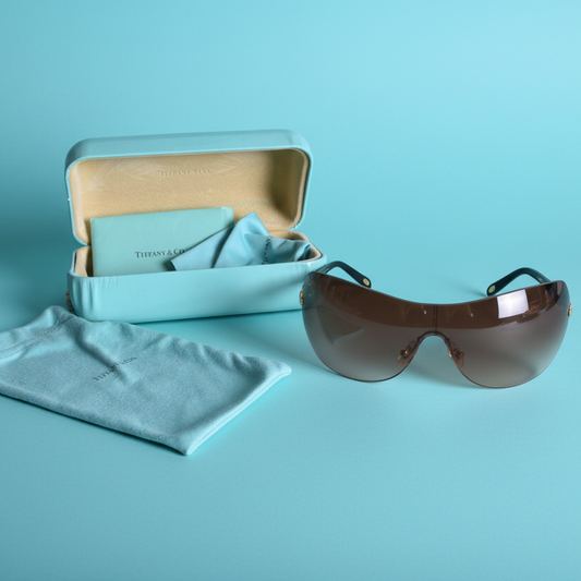 A fine pair of Tiffany &amp; Co Sun glasses / lunettes de solei with Tiffany papers and in their Tiffany box
