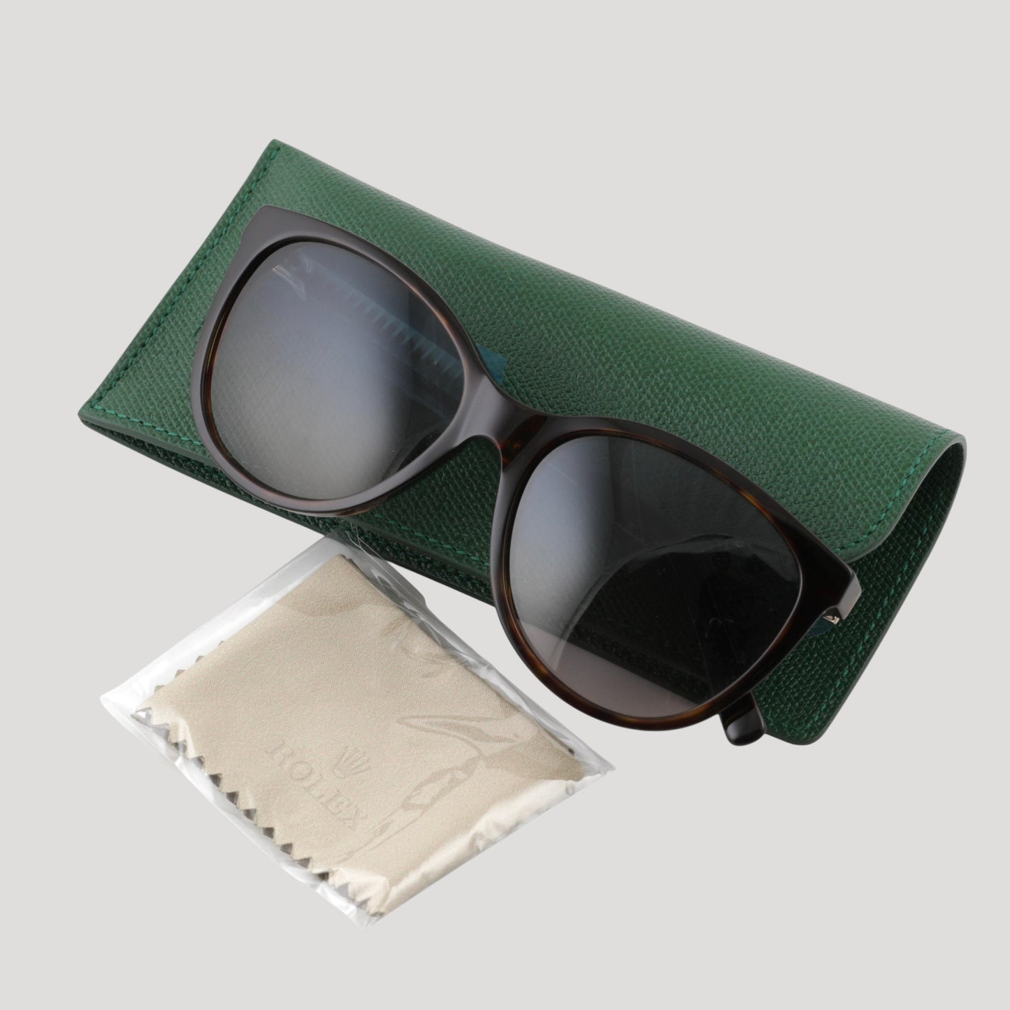 Rolex New Sun glasses / lunettes de soleil in their Rolex box