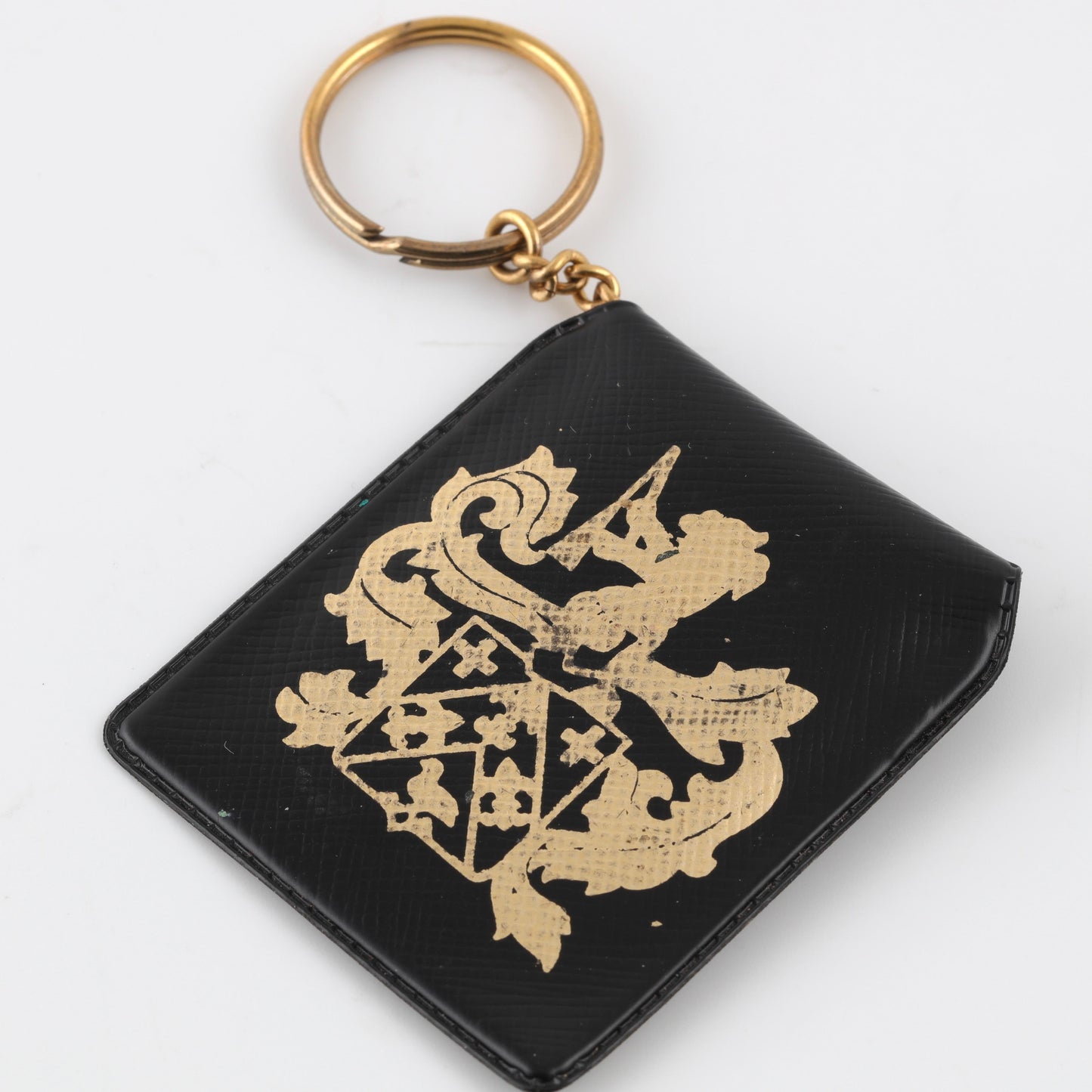 Piaget coin key holder in gilt metal