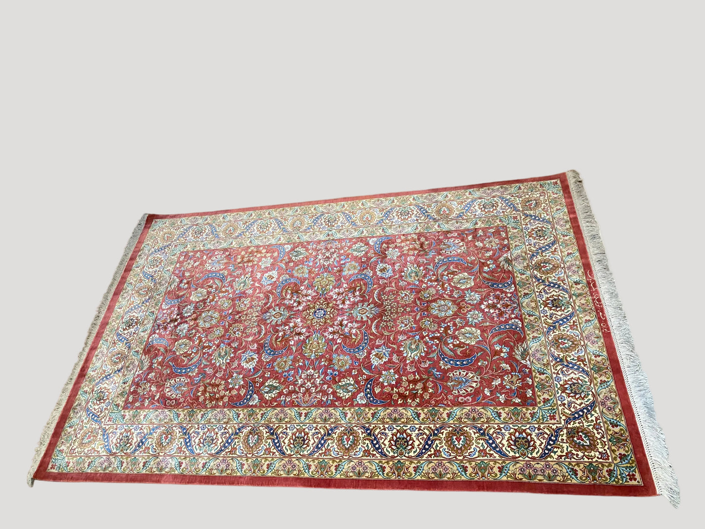 Magnificent signed silk Ghom rug, Iran, second half of the 20th century
