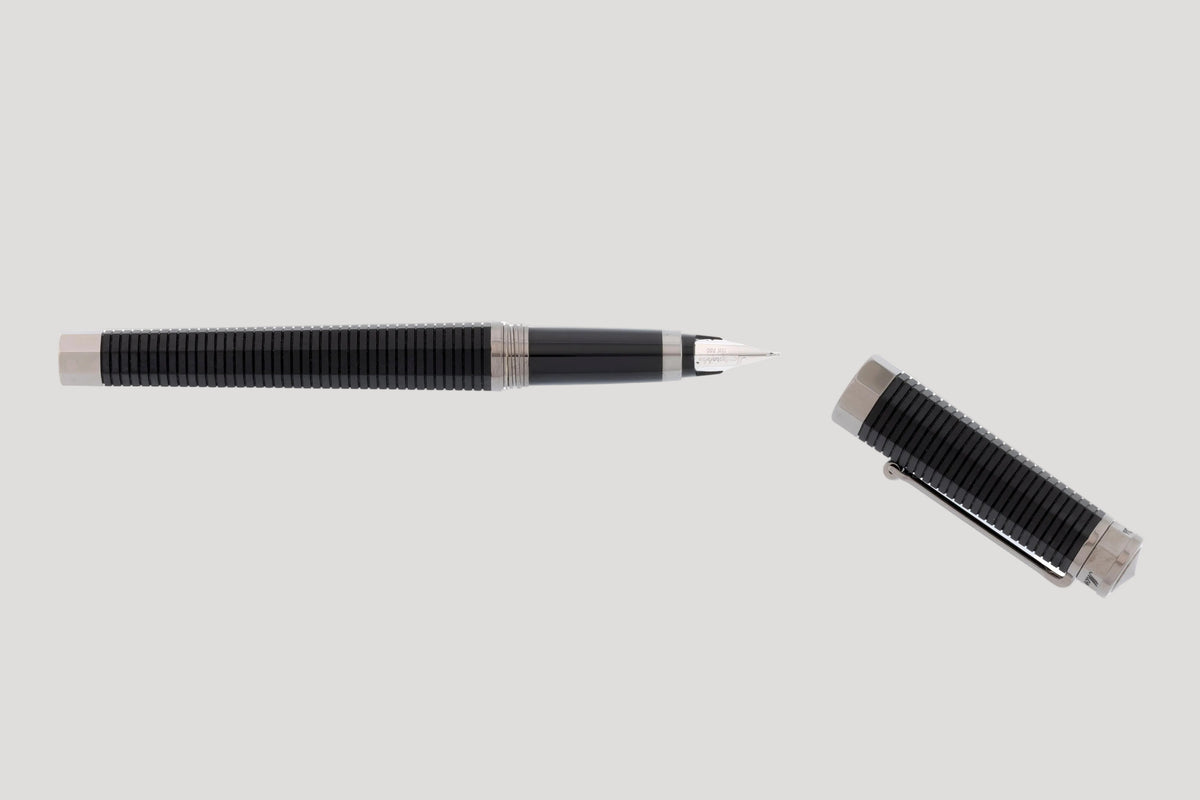 Montegrappa, octagonal fountain pen in silver-plated metal & black resin, with a 18k gold nib