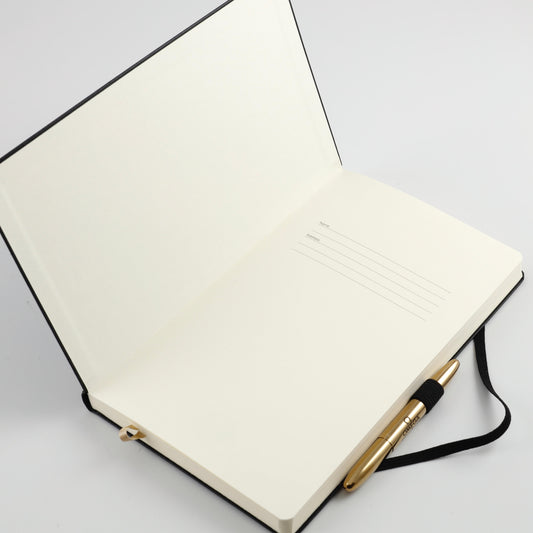 OMEGA 50th moon landing anniversary ballpoint pen stylo & a black notepad
