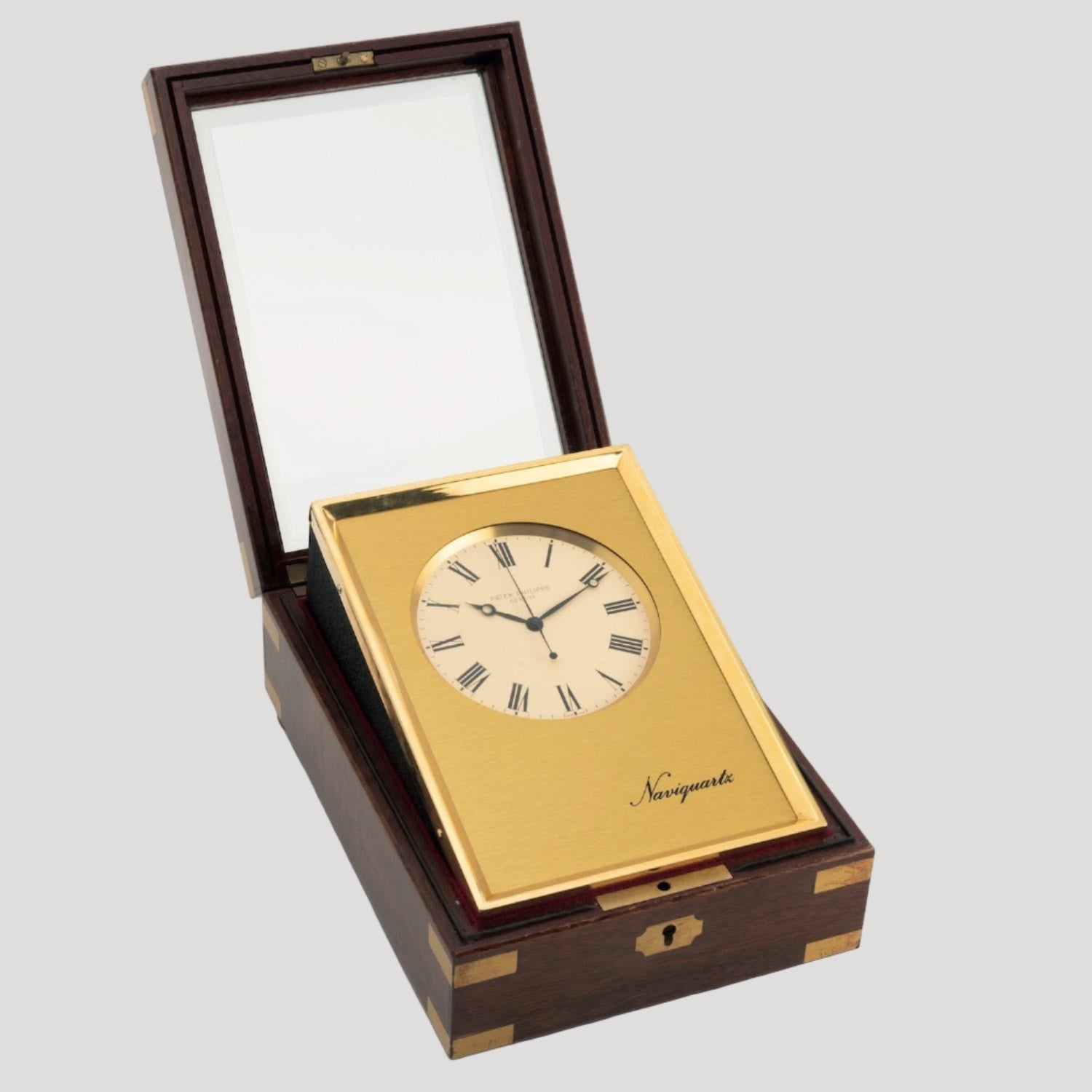 Patek Philippe Naviquartz Table clock in its original Patek mahogany case Ref.1208 Rare