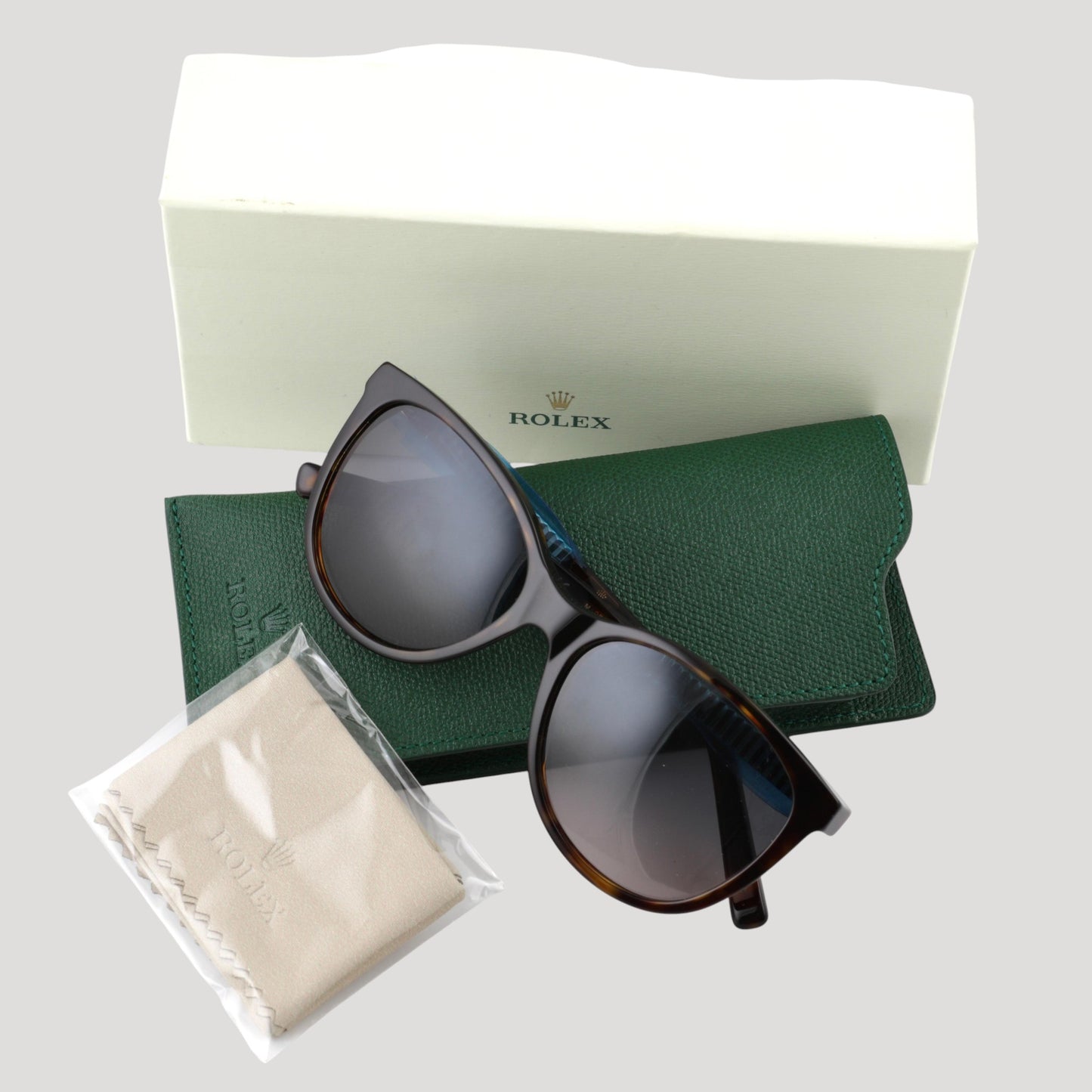 Rolex New Sun glasses / lunettes de soleil in their Rolex box