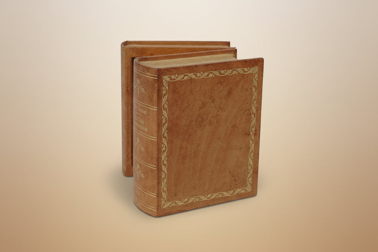  fine and very rare Jaeger-LeCoultre Charming book form desk clock modeled as two leather style volumes of Alexandre Dumas "Les Trois Mousquetaires". 