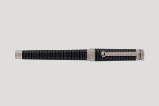 Montegrappa, octagonal fountain pen in silver-plated metal & black resin, with a 18k gold nib
