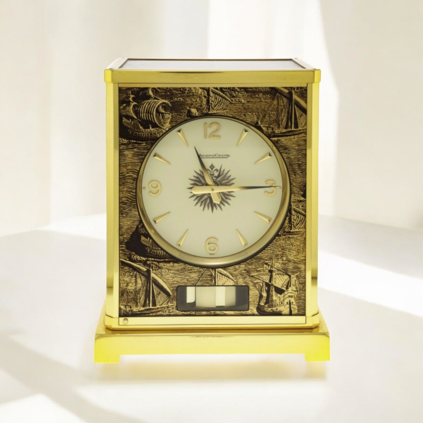 Jaeger-LeCoultre Atmos gilt metal cabinet clock with marine deco Rare model with ships